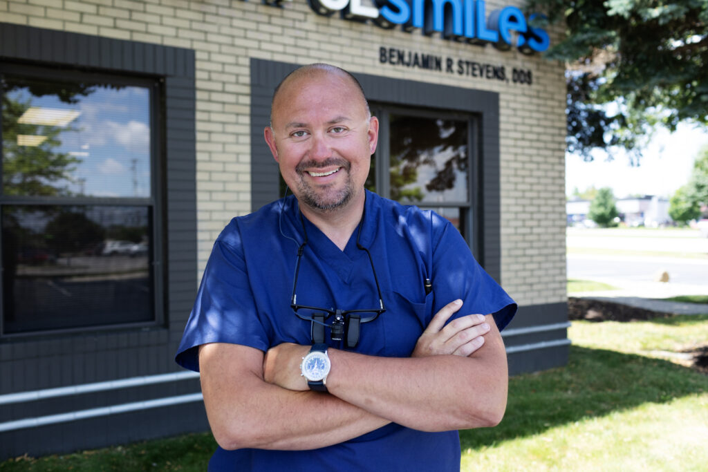 Dr. Ben Stevens smiling out of his office Beautiful Smiles