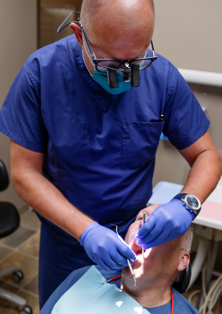 Dr. Ben Stevens treating a dental implants patient